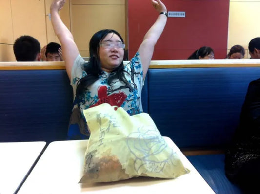 Woman Sits Down At KFC Table For A Week, Refuses To Stand Up